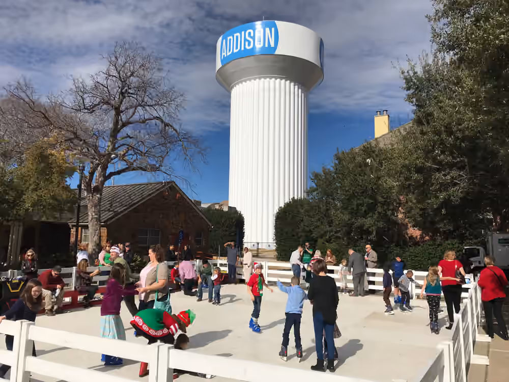 A large Classic Holiday community rink near the Addison water tower