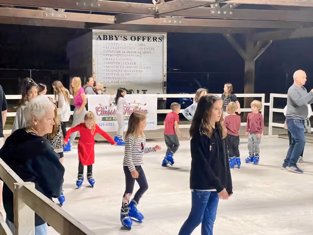 Guests skating beside a community pavilion